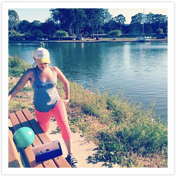 @anais.aquino doing one of our 10-minute online challenge workouts at a park bench.