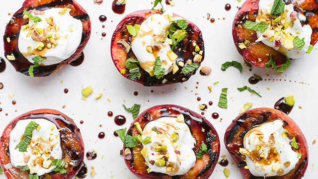 Grilled Peaches with Balsamic, Coconut, + Pistachios