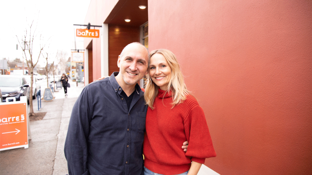 Jonathan Fields and Sadie Lincoln in front of the barre3 North Williams studio.