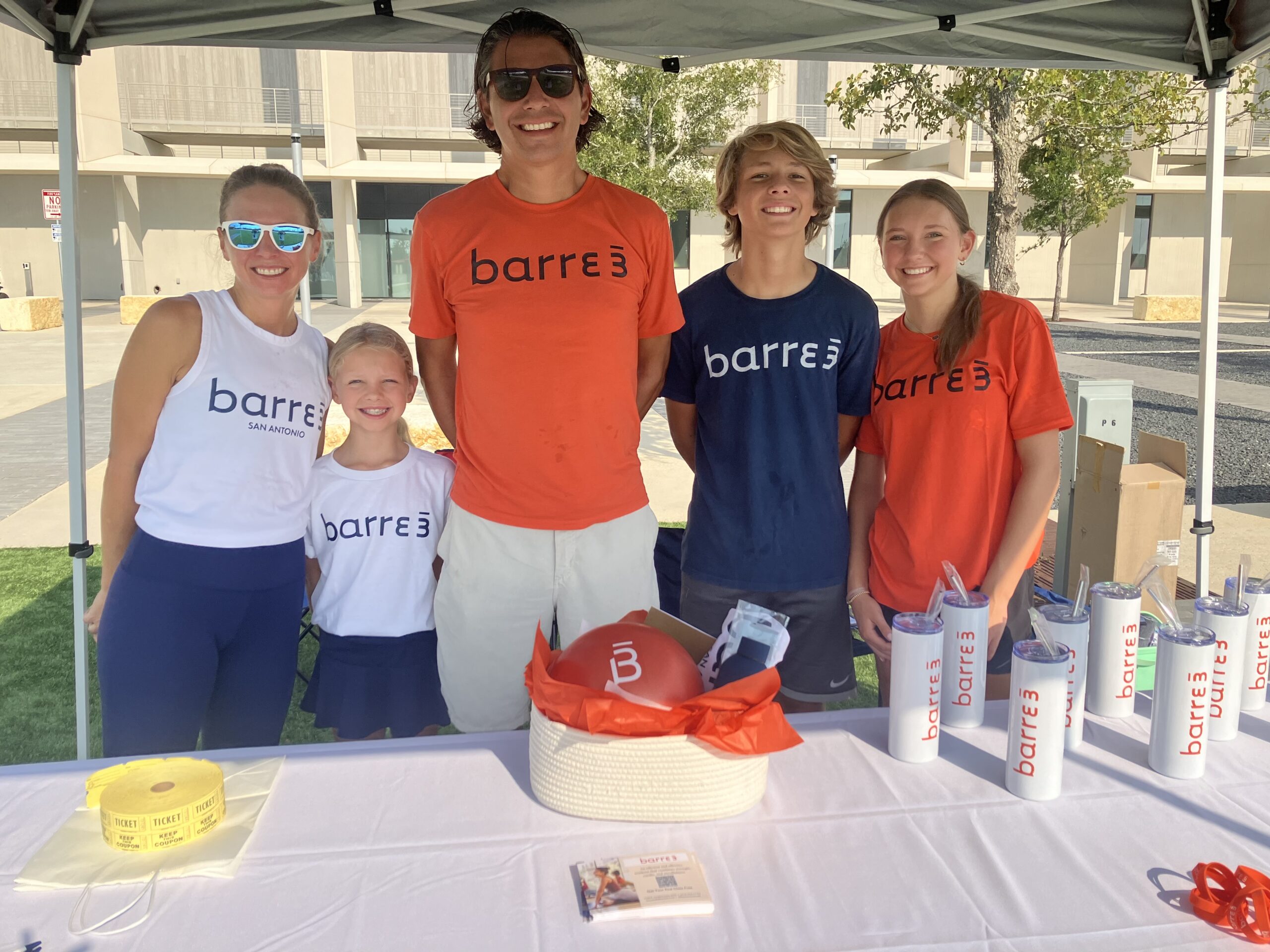 Kristi at an event promoting her barre3 studio with her family.