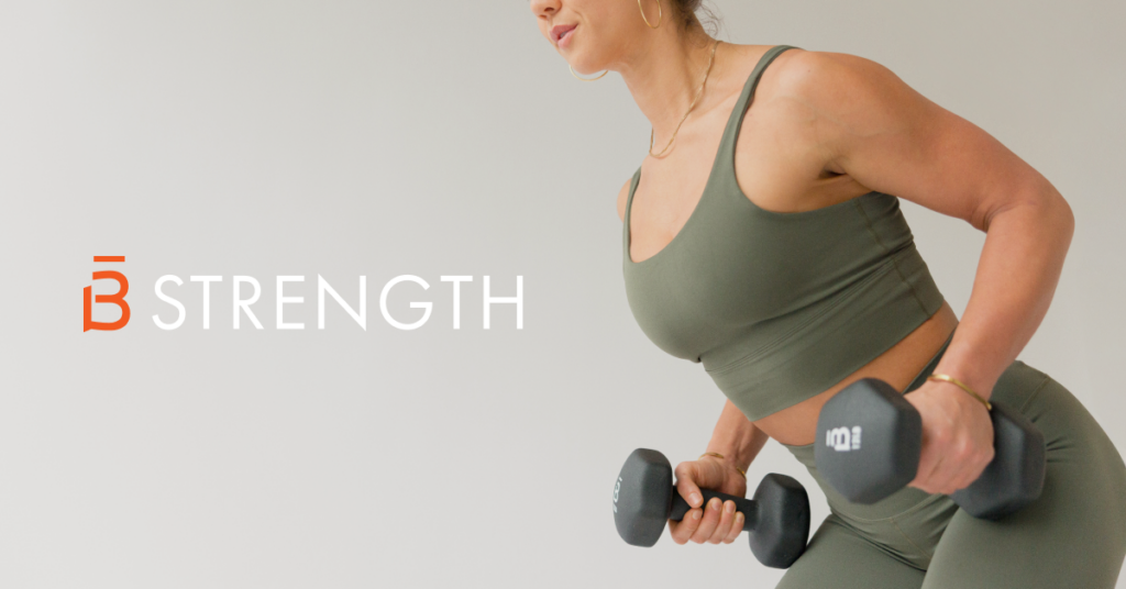 Woman lifting heavy weights with the barre3 strength logo positioned to the left-hand side of the screen.